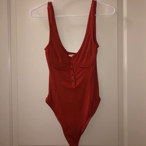 Burnt red color bodysuit
